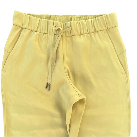 Lululemon On the Fly 7/8 Pant *Woven In Vintage Gold Style W5BPMS Women’s Size 6 - Picture 5 of 10